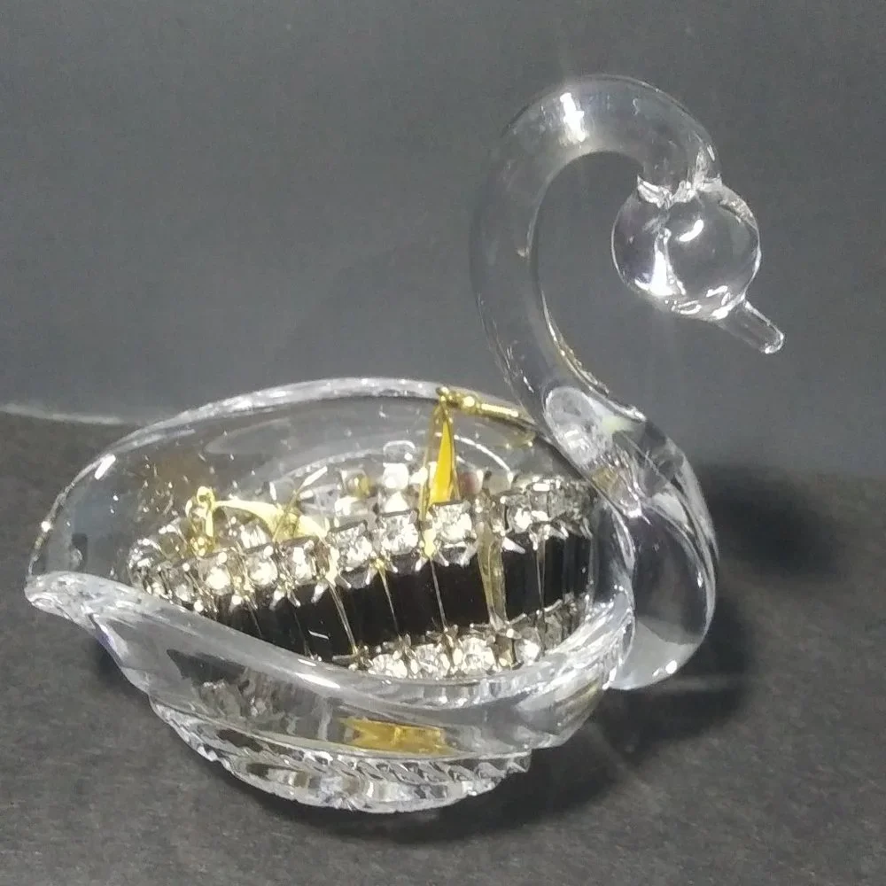 lovely clear glass swan shaped trinket dish with cut design on sides